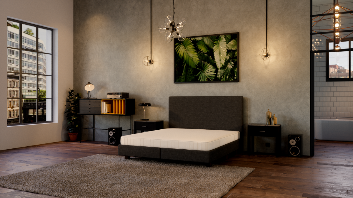 Schlafzimmer im Industrial-Style mit unbezogener Matratze